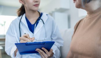 Asian caregiver psychology doctor examine and listen to woman patient for psychologic health care.